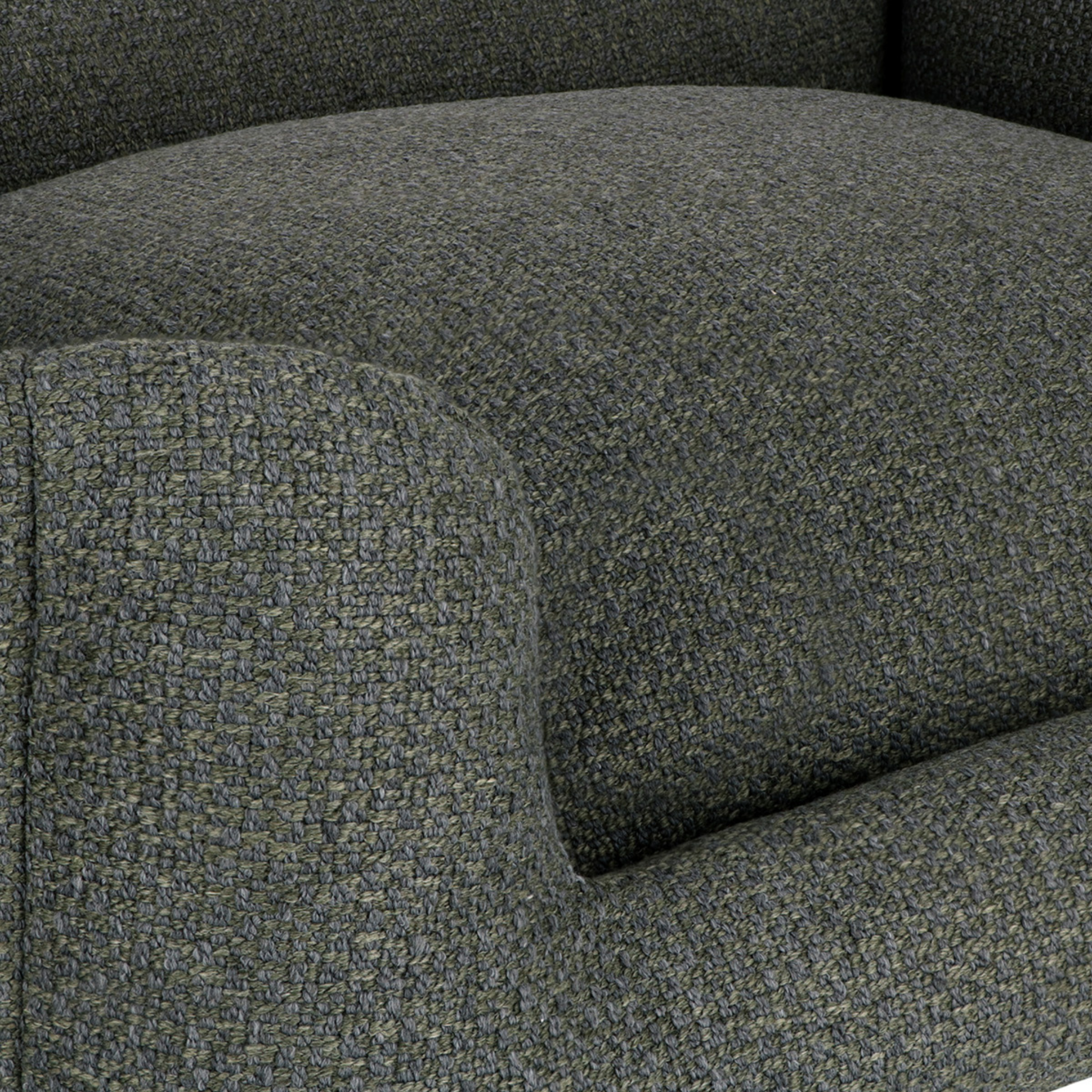 Close-up of a textured upholstered armchair in dark charcoal gray fabric, showing the seat cushion and rounded arm detail.
