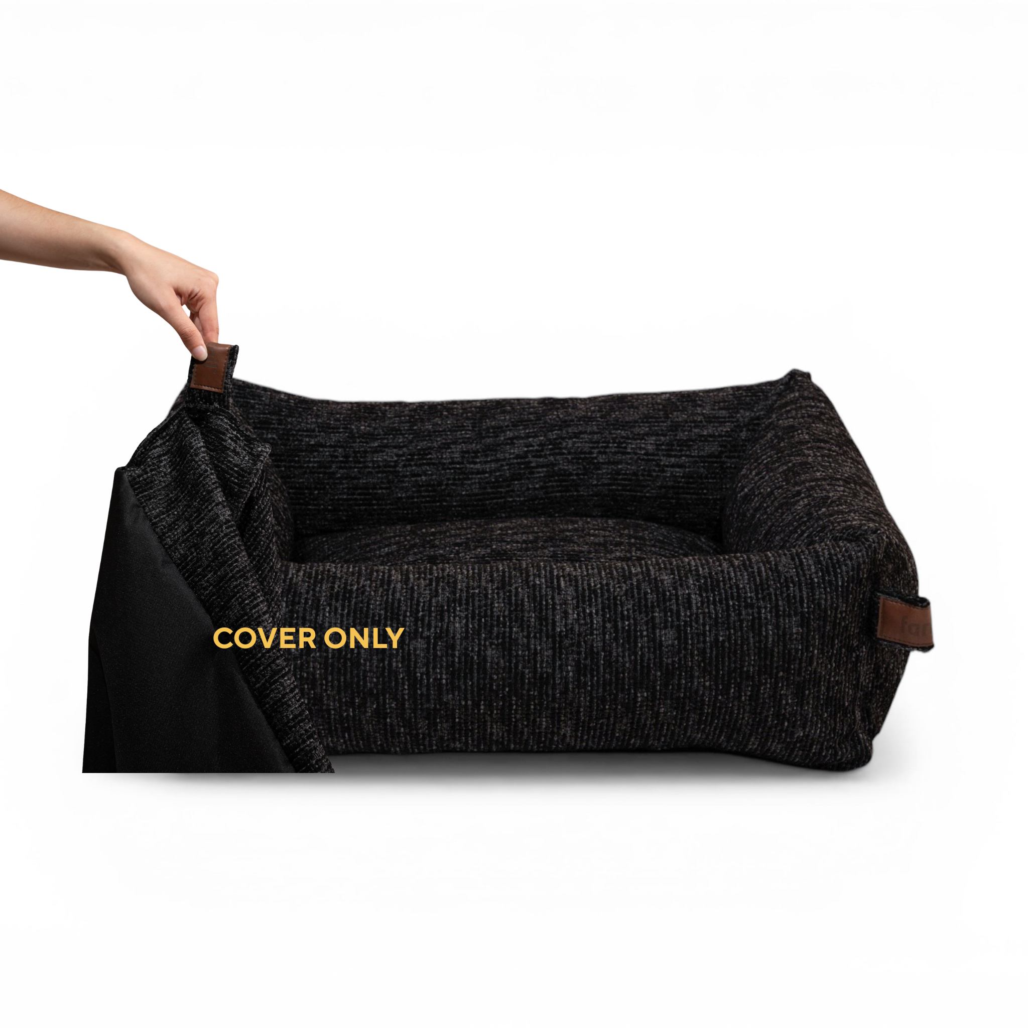 A hand lifting the removable cover off the Snug dog bed in Coal Grey, labelled Cover only