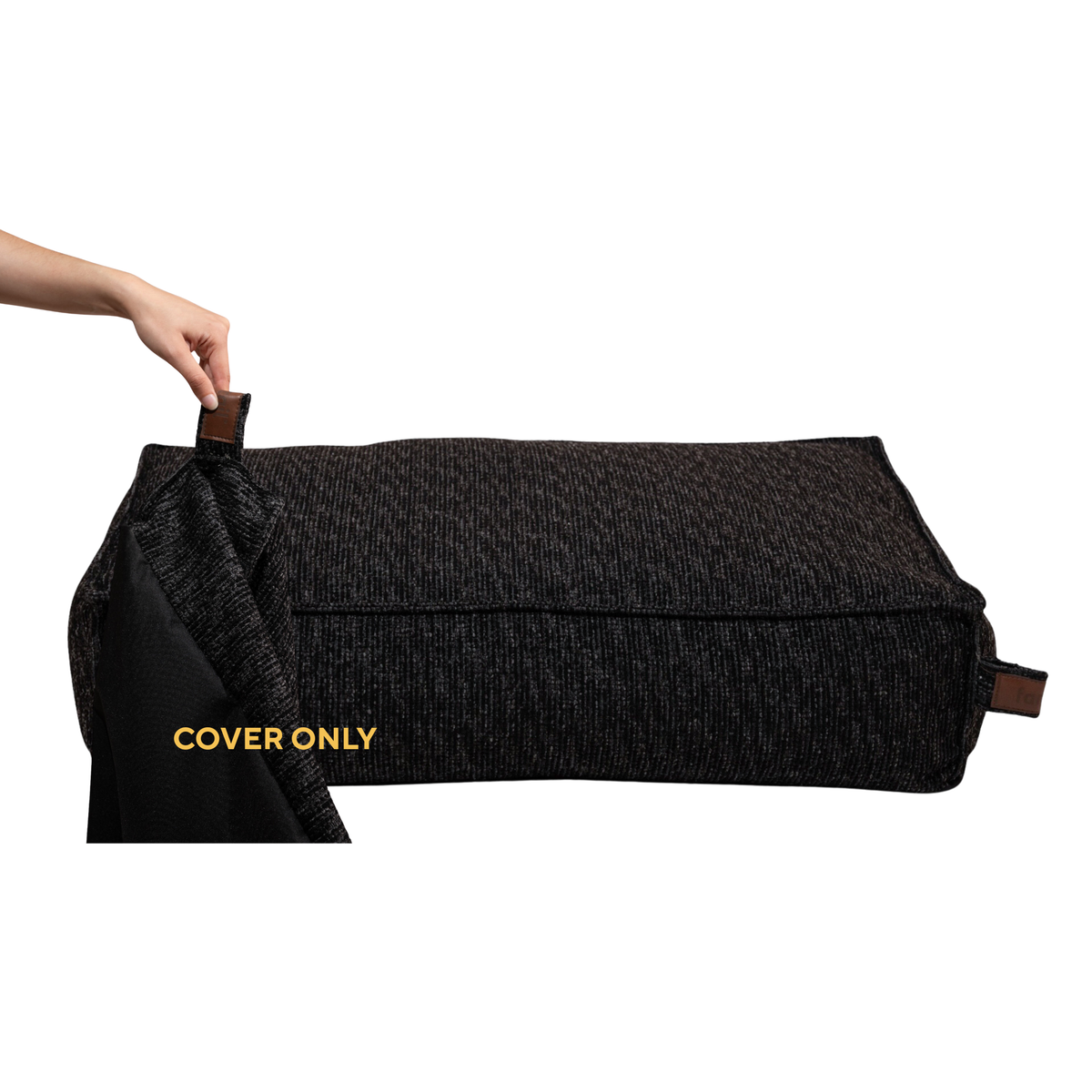 A hand lifting the removable cover off the Stargaze dog mattress in Coal Grey, labelled Cover only