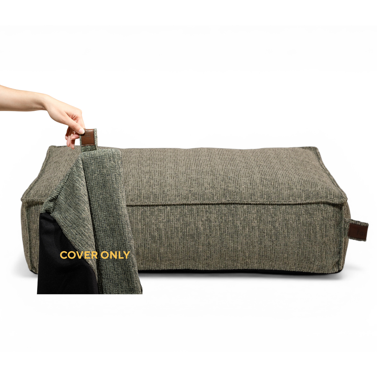 A hand lifting the removable cover off the Stargaze dog mattress in Forest Green, labelled Cover only