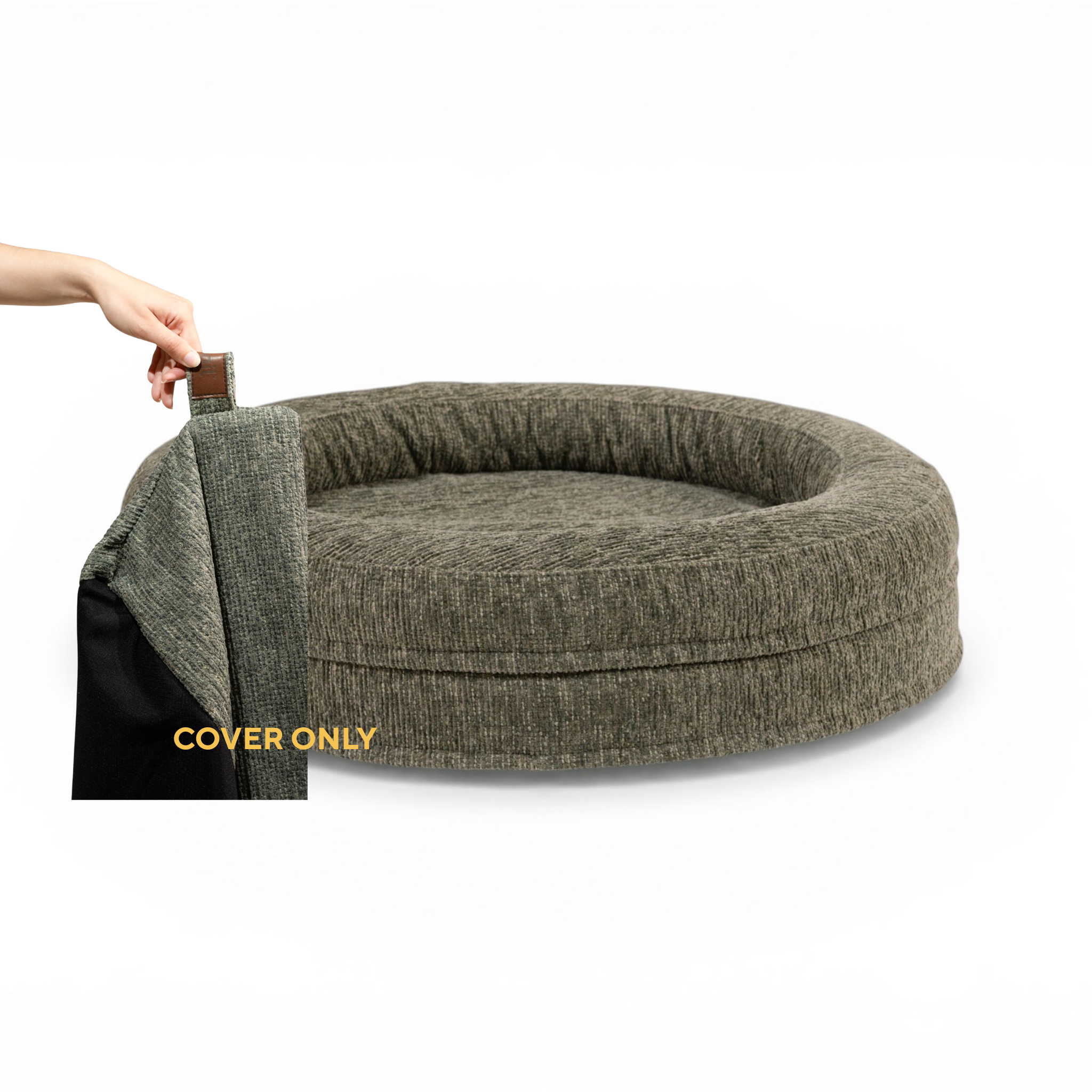 A hand lifting the removable cover off the round Swirl dog bed in Forest Green, labelled Cover only