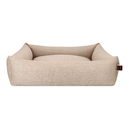 The Snug dog bed in British Tan, shown against a white background 