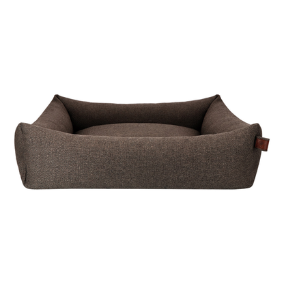 The Snug dog bed in Deep Taupe, shown against a white background 