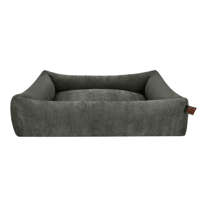 The Snug dog bed in Emerald Green, shown against a white background 