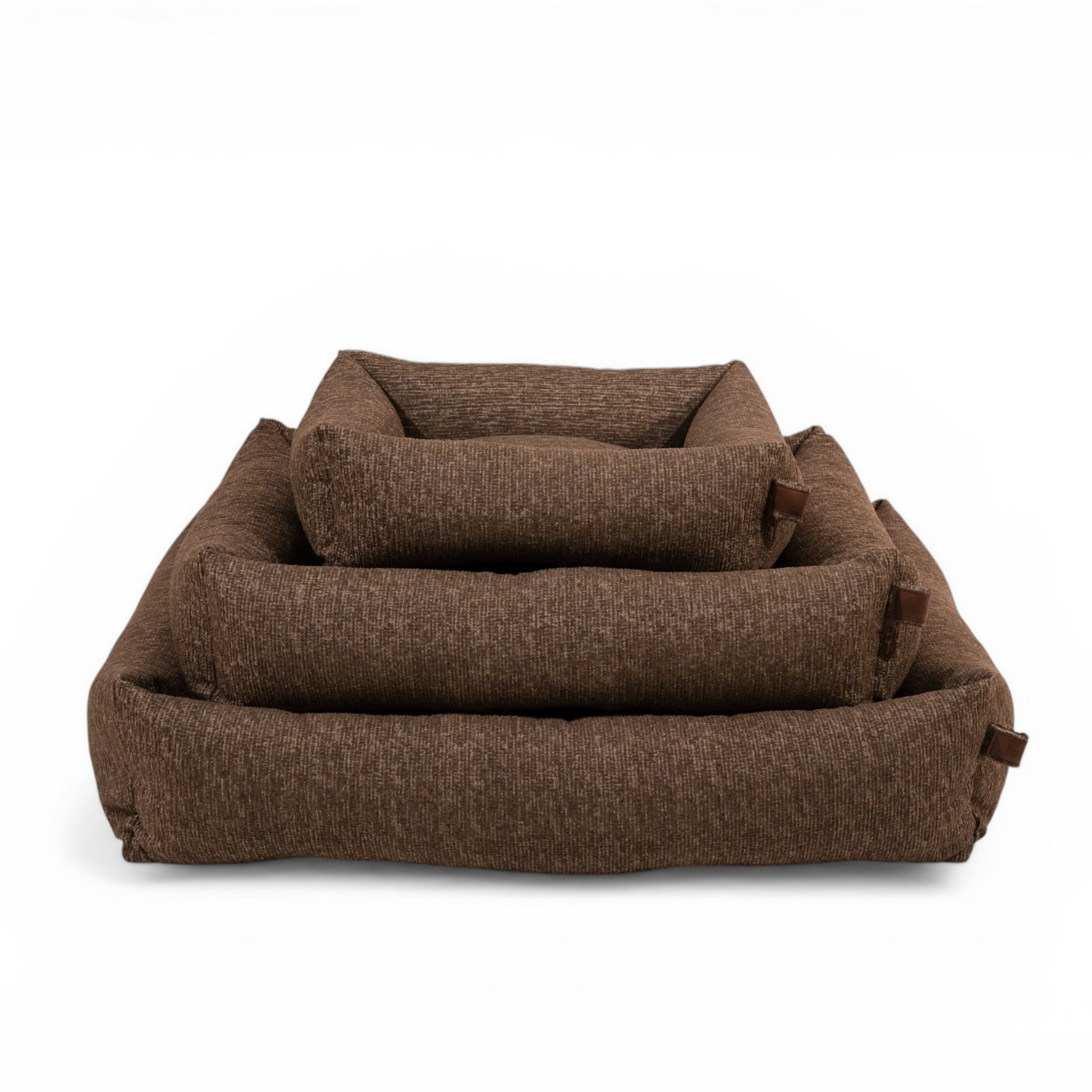 The Snug dog bed in Espresso Brown in all three sizes, nested together 