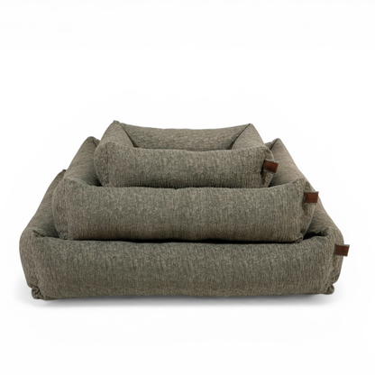 The Snug dog bed in Forest Green in all three sizes, nested together 