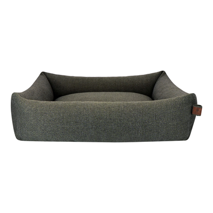 The Snug dog bed in Seaweed Green, shown against a white background 