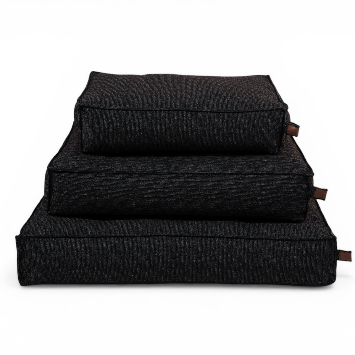 The Stargaze dog mattress in Coal Grey in all three sizes, stacked 