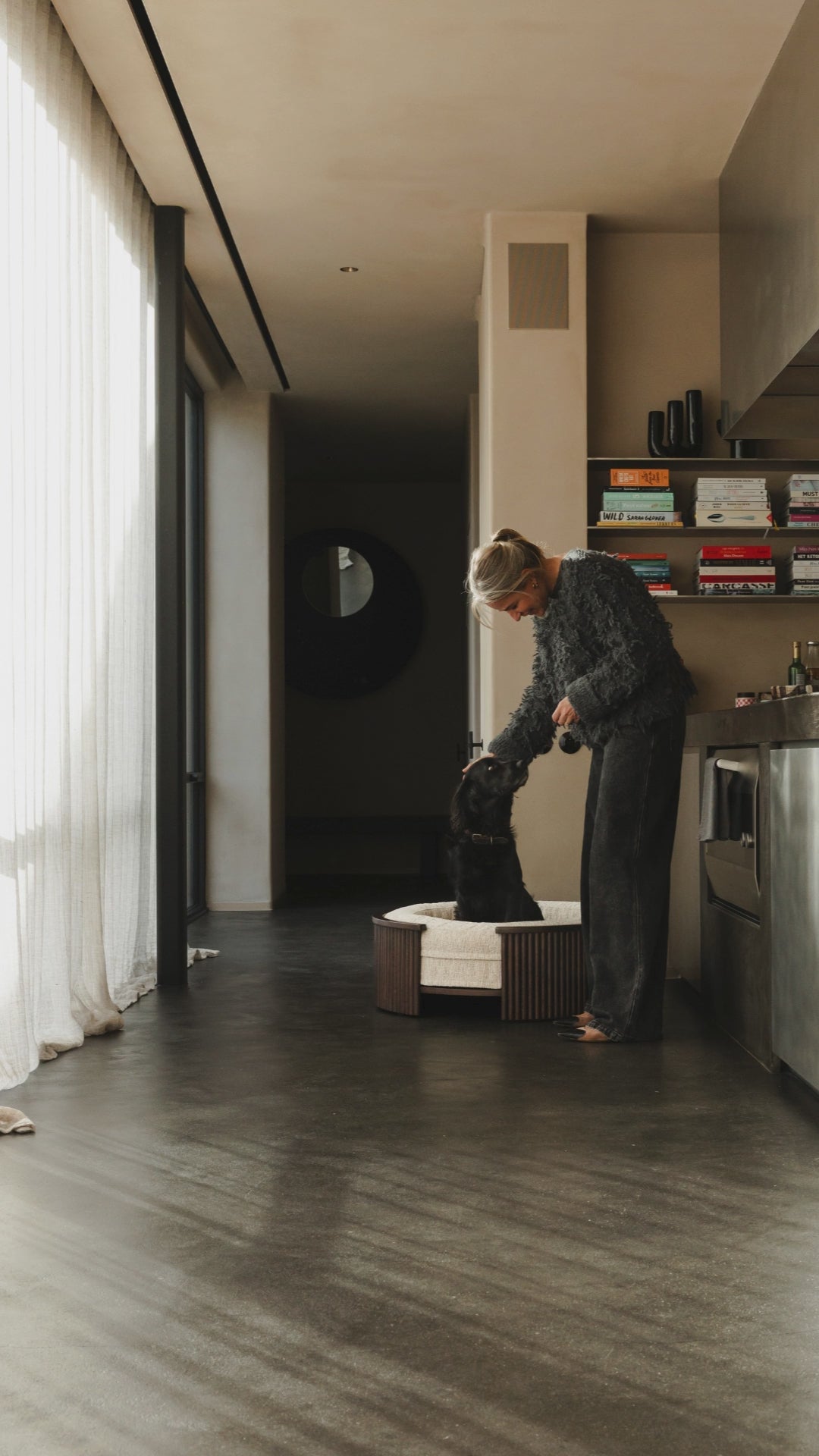 Load video: Dog in beige dog bed